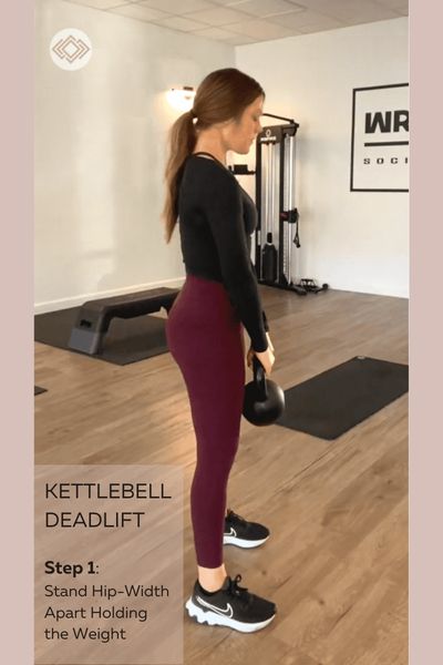 Personal Trainer Sequoia Haldan showing the starting position for a kettlebell deadlift- standing hip-width a part.