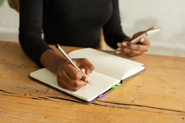 A personal trainer working on her sales goals.